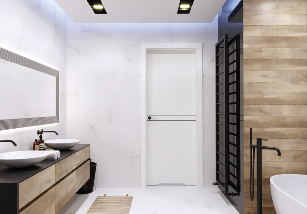 białe drzwi do łazienki z czarnymi intarsjami i podcięciem wentylacyjnym