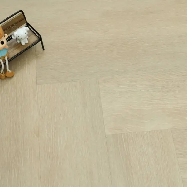 Panele winylowe SPC ze zintegrowanym podkładem Jodełka Gra